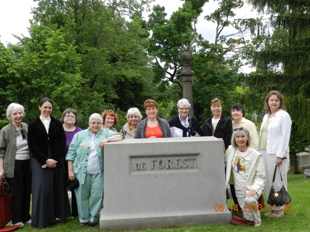 Attendees at the gravesite of Marian deForest